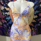 Traje tirillas print tropical colores pasteles