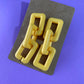 Aretes cadenas amarillas